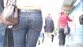 A horny voyeur follows a hot bitch in tight jeans and heels