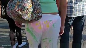 Girl in sheer pants walking on the bridge.