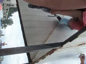 Babe in black panty holding towel between sexy legs