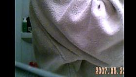 Hidden of wife getting into shower and lotion after