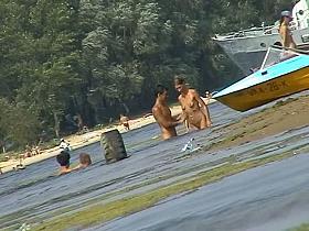 Russian nudist beach with couples sunbathing sweet