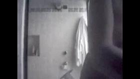 wiping the sperm of her boobs