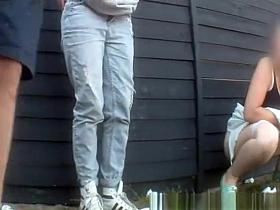 Group of women secretly taped peeing outdoors