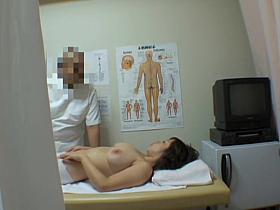 Nasty masseur fucking big titted Asian doll on spy cam