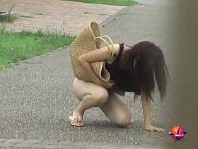 Sharking of an Asian girl wearing no panties under her skirt