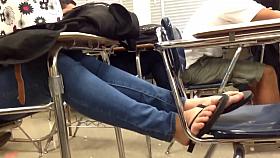 Candid feet flip flops on chair 2