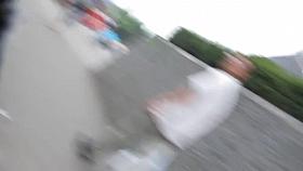 Girl in white dress wonderful upskirt on the avenue