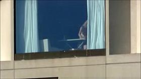 Spying hotel room window