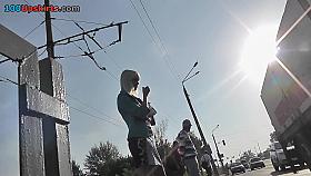 Sexy blonde gal shows off g-string in candid upskirts