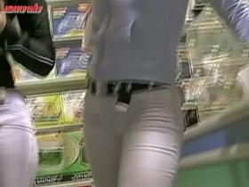 Big butt blonde and brunette caught by street booty voyeur