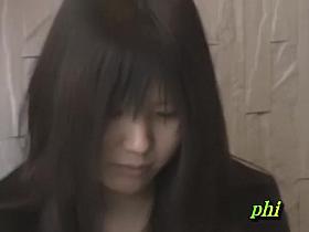 Feisty young Japanese slut holding her phone during sharking adventure