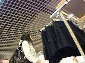 Upskirt video of a chick with white panties in the department store