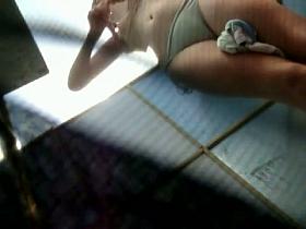 Beach dressing room spycam video with a fresh girl