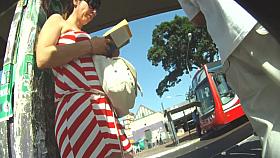 Nice looking redheand babe in red and white dress