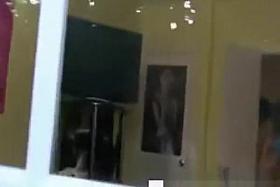 Guys spying on girls through window