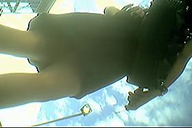 Latina cutie getting her upskirt spied on the bus stop