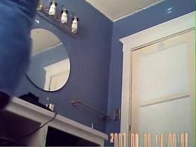 Woman spied before and after shower