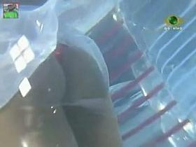 Her almost naked body in white dress is put in water