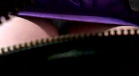 Quite a tight purple skirt.