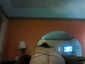 Horny slut in open crotch stockings gets her inviting hole