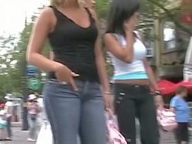 Street candid voyeur is filming pretty ladies in fancy outfit