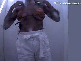 Girl changing clothes for bikini