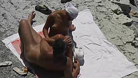 Now girlfriend masturbate him and helped cum on the beach