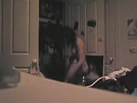 Spy cam girl pays much attention to her nub when dressing