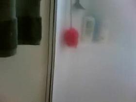 Husband films his busty wife taking a shower