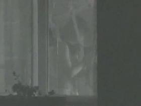 Neighbor window voyeur films sexy girls tits while dressing