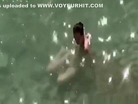 Small breasts woman fucked in rocky beach