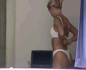 Blonde gets changed through window voyeur