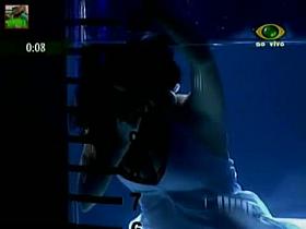 Attractive girl playing in a strange game and swimming