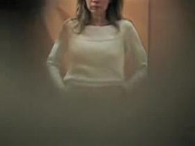 Sexy girl dressing in the changing room hidden cam vid