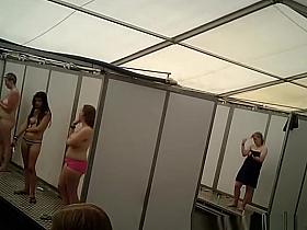 Spy camera in multiple shower cabins