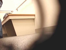 Dressing room girl trying panty on without taking off jeans