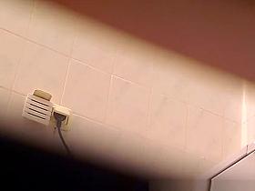 Teen pissing and cleaning her shaved pussy