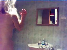 2 girls caught in on hidden cam in bathroom