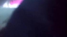 Jerking the cock right behind her