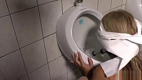 Blonde disgraced in public restroom