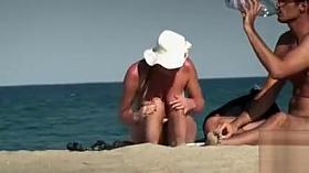 Nudist couple getting some color onto their private parts