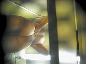 Erotic booty view from the hidden spy cam in change room