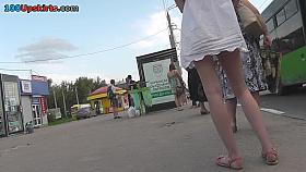Hot upskirts views of a skinny teen in A-line skirt