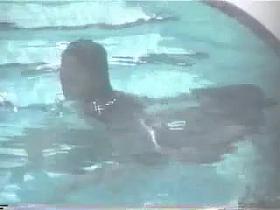 Amateur couple on swimingpool