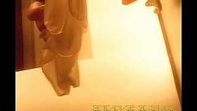 Changing room beauty bends over and shows ass on spy cam