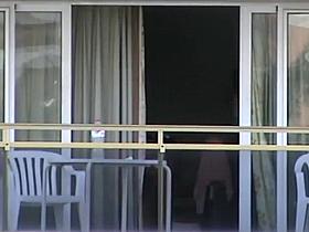 Peep on neighbor girl's tits on a balcony