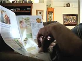 Jerking off behind his morning paper