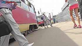 Upskirt porn with a slim blonde wearing tight g-string