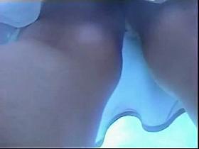 Sexy lady walks the stairs followed by an upskirt chaser