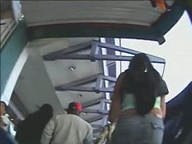 Candid street upskirt video with babe with sexy legs